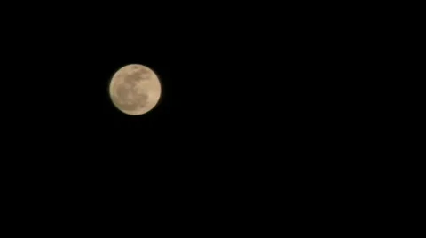 Plane passes near full moon 1 Stock Footage 1096002