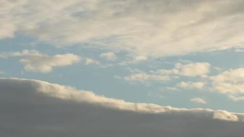 Plane Passes Through Sunny Clouds 스톡 동영상 143563031