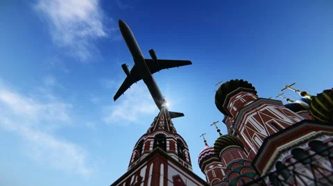Plane passing at The Cathedral of Vasily the Blessed in Moscow, Russia. Stock Footage 40342976