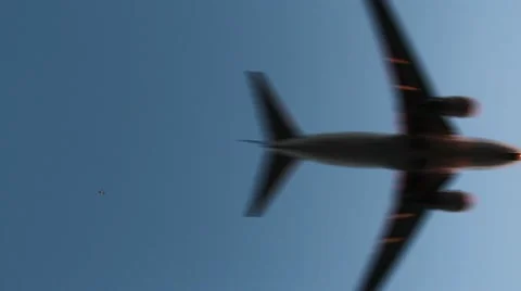 Plane Passing Far Above with Closer Plane Passing Stock Footage 8978523