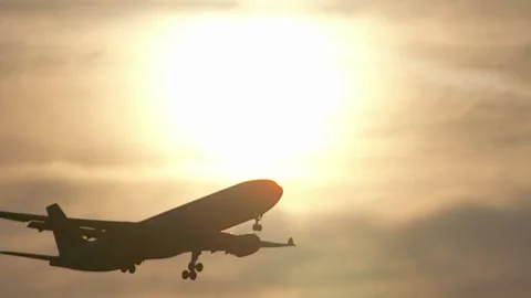 Plane Passing In Front Of The Sun During Landing Video stock 91661553