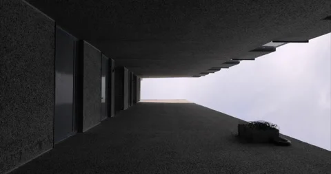 Plane Passing Overhead Between Two Tower Blocks 库存影片 201390980