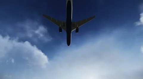 Plane passing through the sky Stock Footage 49746168