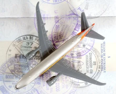 Plane on passport Stock Photos