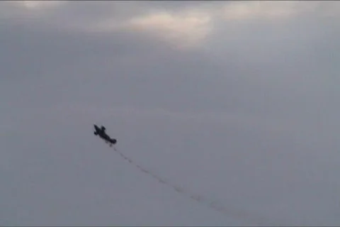 Plane performing in an air show Stock Footage 101002