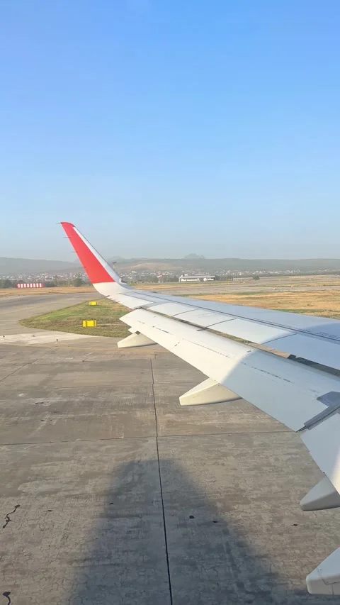 The plane picks up speed on the runway before takeoff Stock Footage 305599474