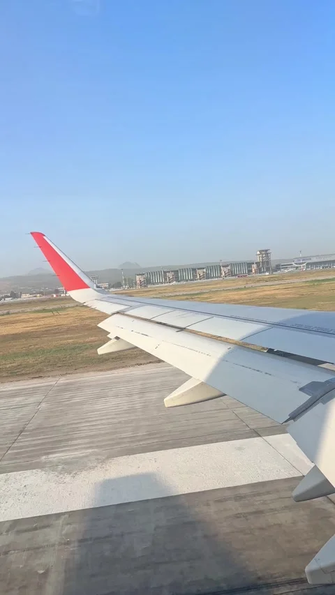 The plane picks up speed on the runway before takeoff Stock Footage 305600433