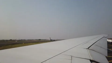 Plane position in Runaway And Wing Of Airplane From Window Stock Footage 158016546