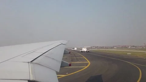 Plane position in Runaway And Wing Of Airplane From Window Stock Footage 158016597