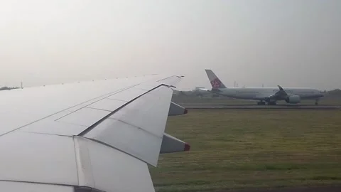 Plane position in Runaway And Wing Of Airplane From Window Stock Footage 158016600