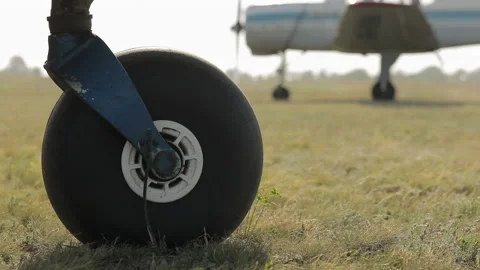 The plane prepares for take-off, the wheel closeup 動画素材 133336172
