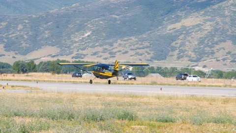 Plane with propeller is running on the runway to take off Stock Footage 116736309