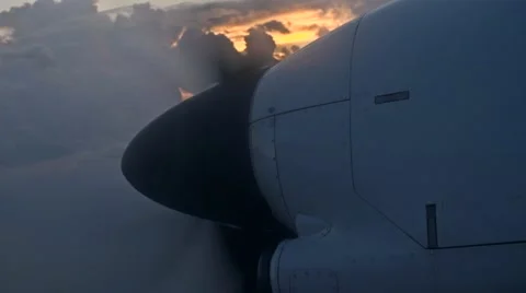 Plane propeller slow mo past dramatic clouds sunrise on top 01 스톡 동영상 49943407