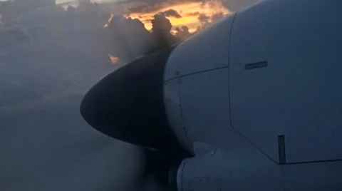 Plane propeller slow mo past dramatic clouds sunrise on top 03 스톡 동영상 49943606