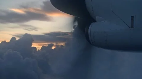 Plane propeller slow mo through sunrise dramatic cloud 스톡 동영상 49946370