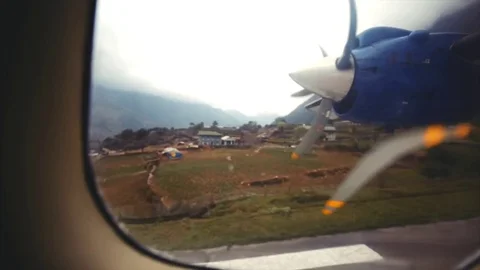 Plane propeller while plane takes off from Lukla Tenzing–Hillary Airport. Nepal Stock Footage