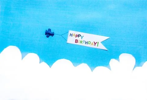 Plane pulling a banner on blue sky Foto stock