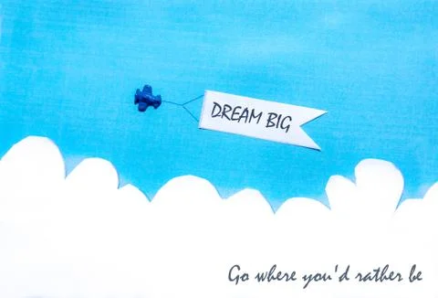 Plane pulling a banner on blue sky Foto stock