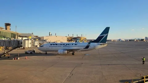 Plane push out 1 Calgary March 10 2026 Stock Footage 330759533