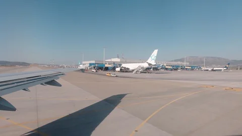 Plane ready to take off from the Athens Greece International Airport Stock Footage 116822889