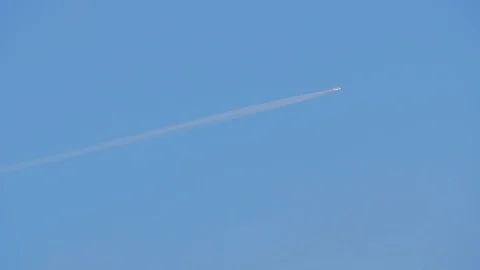 Plane rises in the blue sky. Stock Footage 125748630