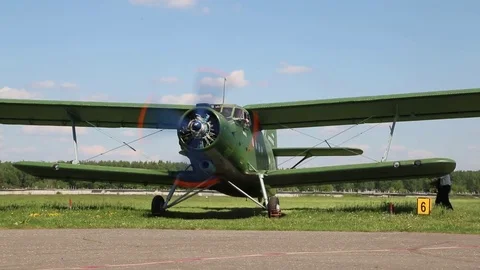 The plane is on the runway, the propeller is spinning. Stock Footage 81223879