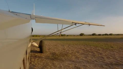 Plane side view starting engine next to ... | Stock Video | Pond5