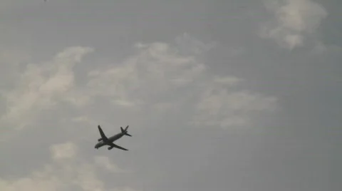 Plane in sky Stock Footage 696171