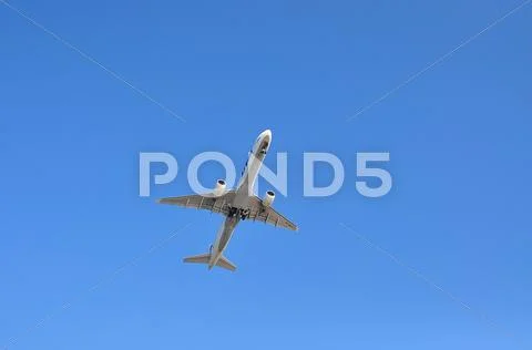 Plane in the sky Stock Photos