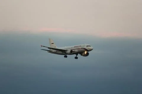 The plane in the sky. Stock Photos