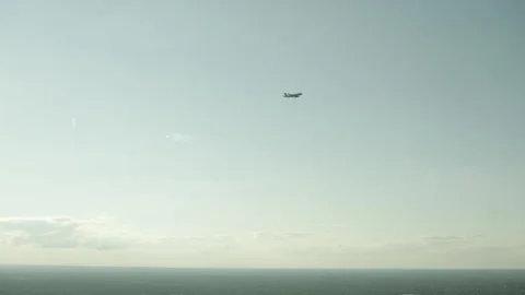 Plane in sky wide shot Stock Footage 197494825