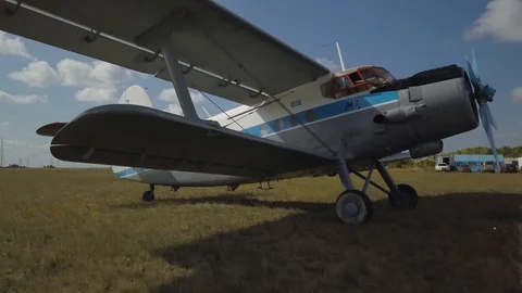 The plane is on a small airfield. Shot on drone Stock Footage 102371406