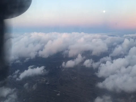 Plane soars over the clouds, lakes and flat lands of Holland (4K) 動画素材 79796384