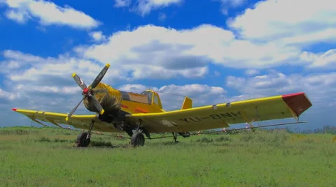 Plane spraying crops Stock Footage 52807734