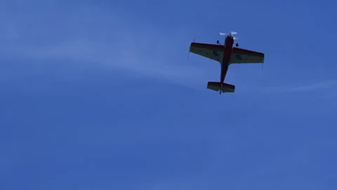 Plane Sukhoi Su-26 Steep Climb Blue Sky Tracking Shot Stock Footage 333493569