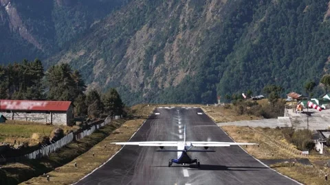 Plane Take Off On Dangerous Short Runway At Lukla Airport Nepal Stock Footage 260830635