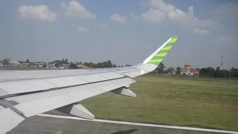 Plane Take Off Shot from Wingside Stock Footage 154400605