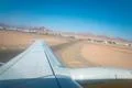 The plane take off on the sunny background Photo