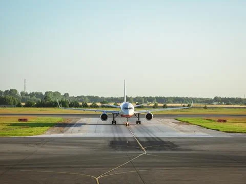 The plane before takeoff. The plane is on takeoff. Stock Photos
