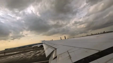 Plane takeoff, wing view of emirates flight from Dubai to Seychelles Stock Footage 324843832