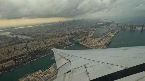 Plane takeoff, wing view of emirates flight from Dubai to Seychelles Stock Footage 324890296