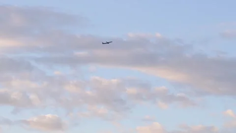 The plane takes off against the background of clouds  Stock Footage 292287473