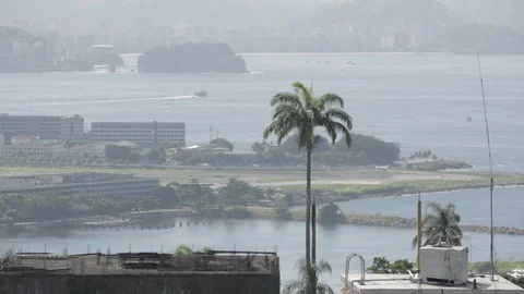 Plane takes off over Rio Stock Footage 91056237