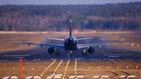 The plane takes off. Runway on the background of the forest. Video stock 103565309