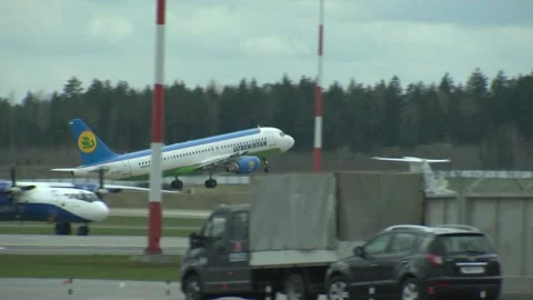 The plane takes off on the runway Stock Footage 88737694