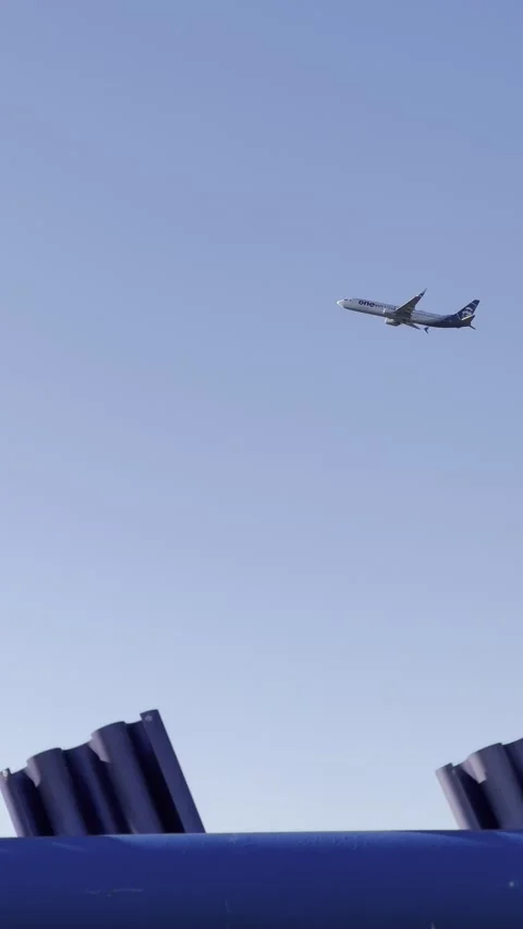 The plane takes off In the sky vertical video airport Stock Footage 241005075