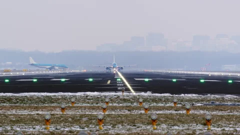 Plane Takes Off on Snowy Runway Stock Footage 335030113