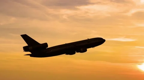 Plane takes off at sunrise background Stock Footage 44977319
