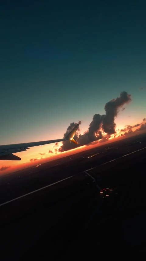 Plane takes off at sunset light Stock Footage 336482228