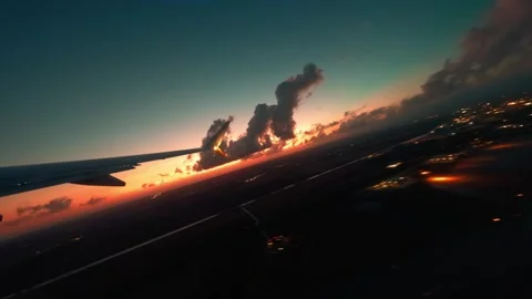 Plane takes off at sunset light Stock Footage 336482232
